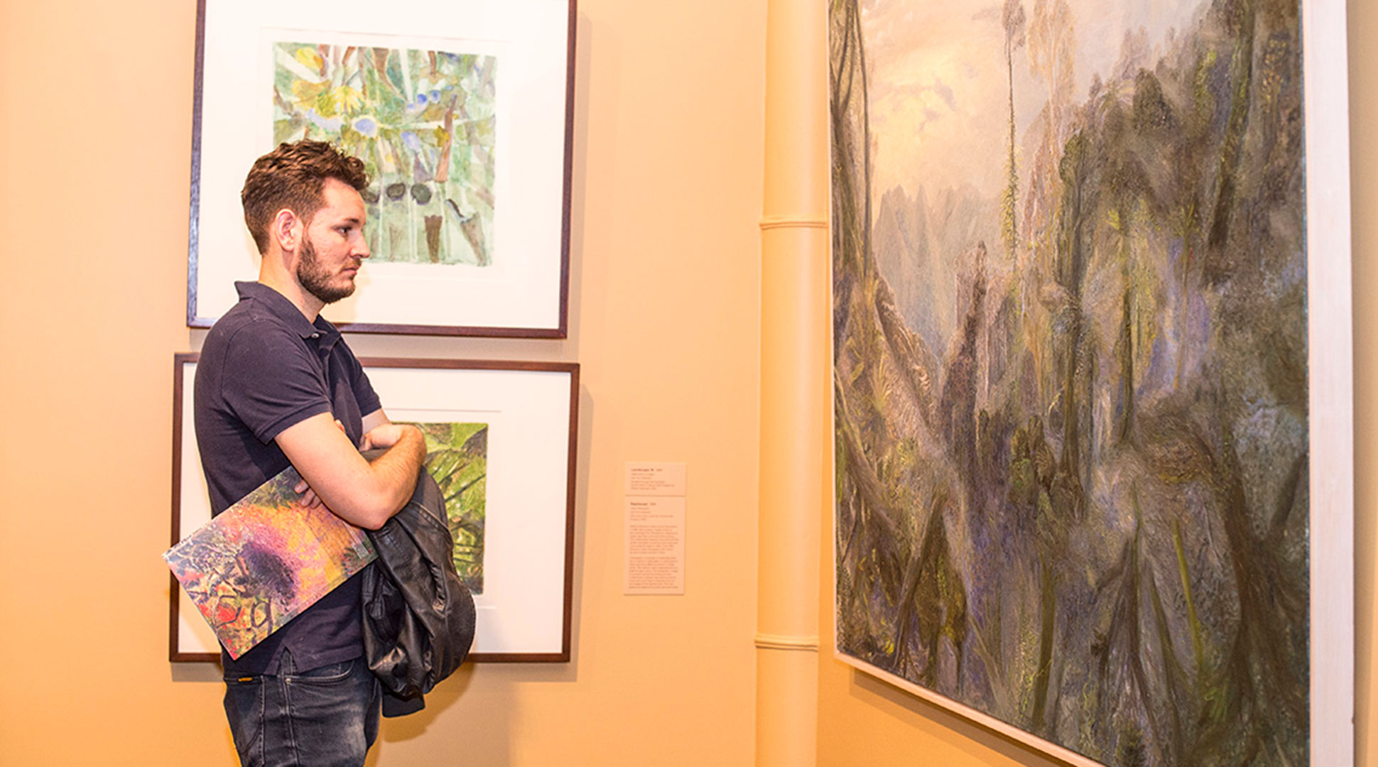 chap viewing artworks at WRG in OGH